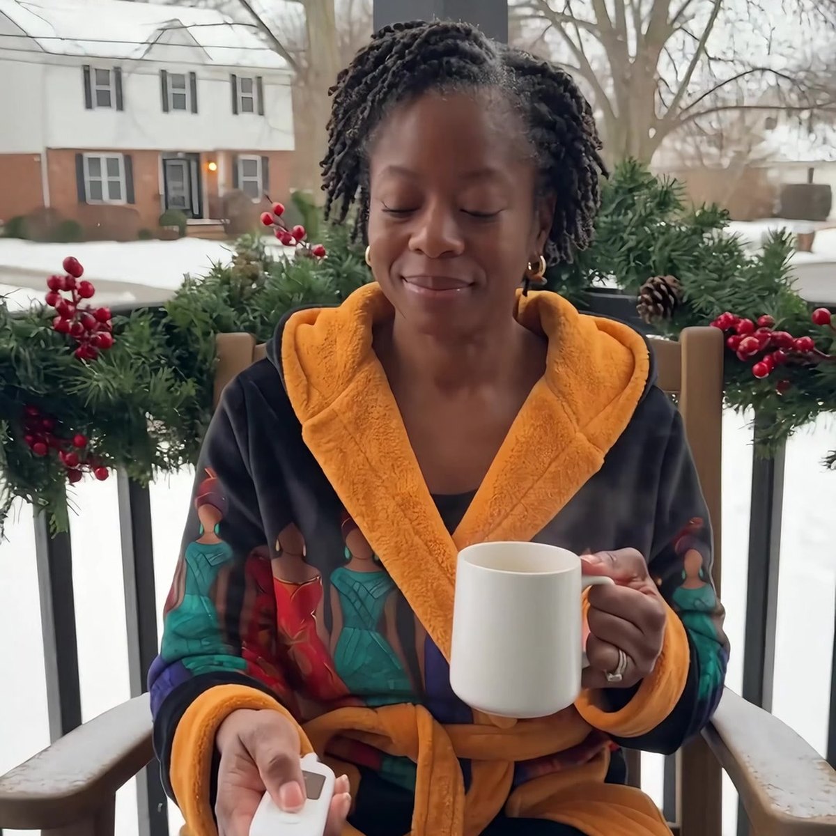 Coffee on a snowy porch in the Rootwarm robe